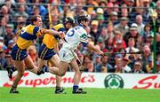 12 July 1998; Paul Flynn of Waterford races clear of Liam Doyle and Frank Lohan of Clare during the Guinness Munster Senior Hurling Championship Final match between Clare and Waterford at Semple Stadium in Thurles, Tipperary. Photo by Ray McManus/Sportsfile