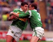 2 August 1998; Kerry corner forward Ronan O'Connor, Foilmore, gets past the challenge of Limerick full back Jason Stokes during the Munster Minor Football Championship Final match between Kerry and Limerick at Semple Stadium in Thurles, Tipperary. Photo by Matt Browne/Sportsfile