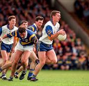 28 June 1998; Peter Cosgrove of Clare in action against Derry Foley of Tipperary during the Bank of Ireland Munster Senior Football Championship Semi-Final match between Tipperary and Clare at the Gaelic Grounds in Limerick. Photo by Brendan Moran/Sportsfile