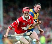 21 June 1998; Sean McGrath of Cork in action against Colin Lynch of Clare during the Guinness Munster Senior Hurling Championship Semi-Final match between Clare and Cork at Semple Stadium in Thurles, Tipperary. Photo by Ray McManus/Sportsfile