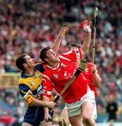 21 June 1998; Sean O'Farrell of Cork in action against Brian Quinn of Clare during the Guinness Munster Senior Hurling Championship Semi-Final match between Clare and Cork at Semple Stadium in Thurles, Tipperary. Photo by Ray McManus/Sportsfile