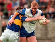 28 June 1998; Senan Hehir of Clare holds off the challenge of Niall Kelly of Tipperary during the Bank of Ireland Munster Senior Football Championship Semi-Final match between Tipperary and Clare at the Gaelic Grounds in Limerick. Photo by Brendan Moran/Sportsfile