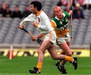 26 July 1998; Shane Elliott of Antrim in action against John Troy of Offaly during the Guinness All-Ireland Senior Hurling Championship Quarter-Final match between Offaly and Antrim at Croke Park in Dublin. Photo by Damien Eagers/Sportsfile