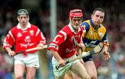 21 June 1998; Sean McGrath of Cork in action against Colin Lynch of Clare during the Guinness Munster Senior Hurling Championship Semi-Final match between Clare and Cork at Semple Stadium in Thurles, Tipperary. Photo by Brendan Moran/Sportsfile