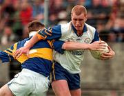 28 June 1998; Senan Hehir of Clare holds off the challenge of Niall Kelly of Tipperary during the Bank of Ireland Munster Senior Football Championship Semi-Final match between Tipperary and Clare at the Gaelic Grounds in Limerick. Photo by Brendan Moran/Sportsfile