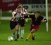 22 November 2001; Stephen Geoghegan, Shelbourne, in action against Eamon Doherty, Derry City. eircom League Premier Division, Derry City v Shelbourne, Brandywell, Derry. Soccer. Picture credit; David Maher / SPORTSFILE *EDI*