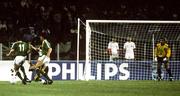 11 June 1990; Kevin Sheedy, 11, of Republic of Ireland, passes the challenge of Gary Stevens of England on his way to scoring his side's first goal during the FIFA World Cup 1990 Group F match between England and Republic of Ireland at Stadio Sant'Elia in Cagliari, Italy. Photo by Ray McManus/Sportsfile