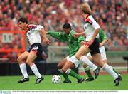 29 May 1994. Phil Babb, Ireland, in action against Karl Heinz Riedle, Germany. Friendly International, Rep of Ireland v Germany, Stuttgart, Germany. Picture Credit: Ray McManus/SPORTSFILE