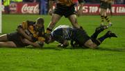 30 November 2001; Brian O'Driscoll, Leinster, goes over for his try despite the tackle of Matt Mostyn, Newport. Leinster v Newport, Celtic League, Quarter Final, Donnybrook, Dublin. Rugby. Picture credit; Matt Browne / SPORTSFILE *EDI*