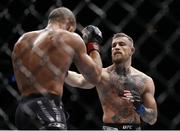 12 November 2016; Conor McGregor, right, in action against Eddie Alvarez during their lightweight title bout at UFC 205 in Madison Square Garden, New York. Photo by Adam Hunger/Sportsfile