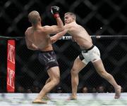12 November 2016; Conor McGregor, right, in action against Eddie Alvarez during their lightweight title bout at UFC 205 in Madison Square Garden, New York. Photo by Adam Hunger/Sportsfile