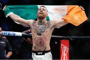 12 November 2016; Conor McGregor celebrates after defeating Eddie Alvarez by second round TKO following their lightweight title bout at UFC 205 in Madison Square Garden, New York. Photo by Adam Hunger/Sportsfile