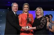 12 November 2016; Bríd Stack of Cork is presented with the Senior Players' Player of the Year award by Marie Hickey, President, LGFA, in the company of Alan Esslemont, Ard Stiúrthóir, TG4, at the TG4 Ladies Football All Stars awards in Citywest Hotel in Dublin.  Photo by Brendan Moran/Sportsfile