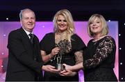 12 November 2016; Mary Hulgraine of Kildare is presented with her All Star award by Marie Hickey, President, LGFA, in the company of Alan Esslemont, Ard Stiúrthóir, TG4, at the TG4 Ladies Football All Stars awards in Citywest Hotel in Dublin. Photo by Brendan Moran/Sportsfile