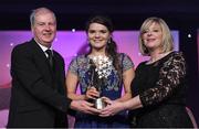 12 November 2016; Marie Ambrose of Cork is presented with her All Star award by Marie Hickey, President, LGFA, in the company of Alan Esslemont, Ard Stiúrthóir, TG4, at the TG4 Ladies Football All Stars awards in Citywest Hotel in Dublin. Photo by Brendan Moran/Sportsfile