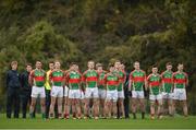 13 November 2016; Loughmore Castleiney players during the playing of the national anthem before the AIB Munster GAA Football Senior Club Championship semi-final game between Dr. Crokes and Loughmore - Castleiney in Killarney Co Kerry. Photo by Diarmuid Greene/Sportsfile