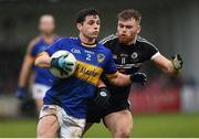 13 November 2016; Kevin Nugent of Maghery Sean MacDiarmada in action against Aaron Morgan of Kilcoo during the AIB Ulster GAA Football Senior Club Championship semi-final game between Kilcoo and Maghery Sean MacDiarmada at Park Esler in Newry. Photo by Philip Fitzpatrick/Sportsfile