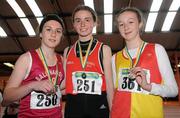 2 April 2011; U-14 Girl's 1000m walk winner Dearbhaile Beirne, Mohill, Co. Leitrim, centre, with second place Eilis O'Dowd, Ballinamore, Co. Leitrim, left, and third place Aloise King, Tallaght, Dublin. Woodie’s DIY Juvenile Indoor Championships, Nenagh Indoor Stadium, Nenagh, Co. Tipperary. Picture credit: Barry Cregg / SPORTSFILE