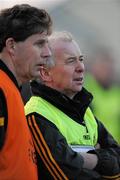 26 March 2011; The Kilkenny manager Dick Mullins, right, watches the last few minutes of the game. Allianz Football League, Division 4, Round 7, Kilkenny v Fermanagh, Conahy Shamrocks GAA Club, Jenkinstown, Co. Kilkenny. Picture credit: Ray McManus / SPORTSFILE