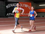 2 April 2011; Aloise King, Tallaght, Dublin, leads Danielle O'Neill, in the U-14 Girl's 1000m race during the Woodie’s DIY Juvenile Indoor Championships. Nenagh Indoor Stadium, Nenagh, Co. Tipperary. Picture credit: Barry Cregg / SPORTSFILE