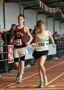 2 April 2011; Anthony Tobin, right, Clonmel, Co. Tipperary, comes to the line to finish in second place ahead of third place Dylan Mimna, Ballinamore, Co. Leitrim, in the U15- Boy's 1000m walk during the Woodie’s DIY Juvenile Indoor Championships. Nenagh Indoor Stadium, Nenagh, Co. Tipperary. Picture credit: Barry Cregg / SPORTSFILE