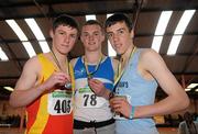2 April 2011; U-17 Boy's 200m winner Marcus Lawlor, St. Laurence O'Toole, Co. Carlow, centre, with second place Keith Doherty, Tallaght, Dublin, left, and third place Eoghan Courtney, St. Brendan's A.C., Co. Offaly. Woodie’s DIY Juvenile Indoor Championships, Nenagh Indoor Stadium, Nenagh, Co. Tipperary. Picture credit: Barry Cregg / SPORTSFILE
