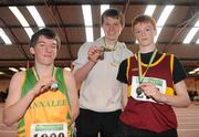 2 April 2011; U-17 Boy's 1500m walk winner Evan Lynch, Clonmel, Co. Tipperary, centre, with second place Gary Turlough, Annalee AC, Co. Cavan, left, and third place Eugene Conlon, Tulla, Co. Clare. Woodie’s DIY Juvenile Indoor Championships, Nenagh Indoor Stadium, Nenagh, Co. Tipperary. Picture credit: Barry Cregg / SPORTSFILE