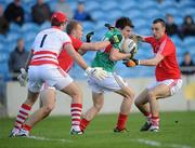 3 April 2011; Jason Doherty, Mayo, in action against Cork players, from left, Ken O'Halloran, Michael Shields and Kevin O'Driscoll. Allianz Football League Division 1 Round 6, Mayo v Cork, McHale Park, Castlebar, Co. Mayo. Picture credit: Stephen McCarthy / SPORTSFILE