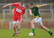 3 April 2011; Brian Menton, Meath, in action against Michael Bateson, Derry. Allianz Football League Division 2 Round 6, Derry v Meath, Celtic Park, Derry. Photo by Sportsfile