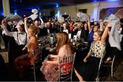 12 November 2016; Attendees wave napkins as The Galway Tenors perform during the TG4 Ladies Football All Star awards at the Citywest Hotel in Dublin.  Photo by Cody Glenn/Sportsfile