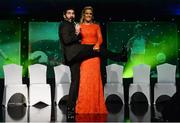 12 November 2016; Seán Costello of The Galway Tenors performs with the help of Bríd Stack of Cork on stage during the TG4 Ladies Football All Star awards at the Citywest Hotel in Dublin.  Photo by Cody Glenn/Sportsfile