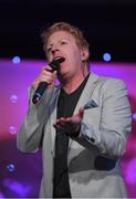 12 November 2016; Tommy Fleming performs on stage at the TG4 Ladies Football All Stars awards in Citywest Hotel in Dublin.  Photo by Brendan Moran/Sportsfile