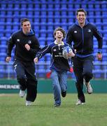 6 April 2011; St Michael’s House, one of Ireland’s largest providers of community based services for children and adults with an intellectual disability, has teamed-up with Leinster Rugby to promote tag rugby for those with an intellectual disability in Ireland. Leinster’s Ireland ‘A’ centre Eoin O’Malley, left, Scotland and Lions lock Nathan Hines, and St Michael’s House service user Sam Lennord, age 14, turned out to celebrate the launch of the partnership at Leinster’s Donnybrook Stadium today. St Michael’s House has introduced tag rugby training for their service users to promote social inclusion and boost physical well being. Representatives from Leinster Rugby are currently training over thirty St Michael’s House service users to compete in a tag rugby blitz this summer. Donnybrook Stadium, Donnybrook, Dublin. Picture credit: Brian Lawless / SPORTSFILE