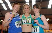 2 April 2011; Sally Rose-Maughan, centre, Castlebar, winner of the U-19 Girl's Long Jump, alongside second place finisher Sinead O'Connor, Traleee Harriers, and third place finisher Suzanne Kelly, right, Kilnaboy, during the Woodie’s DIY Juvenile Indoor Championships. Nenagh Indoor Stadium, Nenagh, Co. Tipperary. Picture credit: Barry Cregg / SPORTSFILE