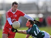 3 April 2011; Brian McGuigan, Tyrone, in action against Daryl Flynn, Kildare. Allianz Football League Division 2 Round 6, Tyrone v Kildare, O'Neill's Park, Dungannon, Co. Tyrone. Picture credit: Brian Lawless / SPORTSFILE