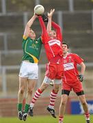 3 April 2011; PJ McCloskey, Derry, in action against Nigel Crawford, Meath. Allianz Football League Division 2 Round 6, Derry v Meath, Celtic Park, Derry. Photo by Sportsfile