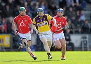 3 April 2011; Rory Jacob, Wexford, in action against Brian Murphy, left, and Tom Kenny, Cork. Allianz Hurling League Division 1 Round 6, Wexford v Cork, Wexford Park, Wexford. Picture credit: Matt Browne / SPORTSFILE