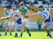 3 April 2011; Shane Dooley, Offaly, in action against Micheal Walsh, left, and Tony Browne, Waterford. Allianz Hurling League Division 1 Round 6, Offaly v Waterford, O'Connor Park, Tullamore, Co. Offaly. Picture credit: Ken Sutton / SPORTSFILE