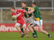 3 April 2011; Martin Donaghy, Derry, in action against Caoimhin King and Shane O'Rourke, right, Meath. Allianz Football League Division 2 Round 6, Derry v Meath, Celtic Park, Derry. Photo by Sportsfile