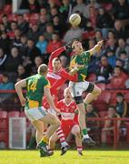 3 April 2011; Mark Ward, Meath, in action against PJ McCloskey, Derry. Allianz Football League Division 2 Round 6, Derry v Meath, Celtic Park, Derry. Photo by Sportsfile
