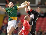 3 April 2011; Joe Sheridan, Meath, in action against goalkeeper Michael Conlon and Kevin McCloy, Derry. Allianz Football League Division 2 Round 6, Derry v Meath, Celtic Park, Derry. Photo by Sportsfile