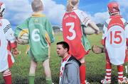 3 April 2011; A Tyrone fan makes his way to the match. Allianz Football League Division 2 Round 6, Tyrone v Kildare, O'Neill's Park, Dungannon, Co. Tyrone. Picture credit: Brian Lawless / SPORTSFILE