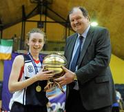 23 March 2011; Bernard O'Byrne, Secretary General of Basketball Ireland, presents Megan O'Leary, St.Vincents, Cork, with the player of the match award. Basketball Ireland Girls U16A Schools League Final, St.Vincents, Cork v Mercy Mounthawk, Tralee, Co. Kerry, National Basketball Arena, Tallaght, Co. Dublin. Picture credit: Brian Lawless / SPORTSFILE