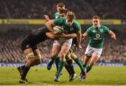 19 November 2016; Andrew Trimble of Ireland is tackled by Ardie Savea of New Zealand during the Autumn International match between Ireland and New Zealand at the Aviva Stadium in Dublin. Photo by Ramsey Cardy/Sportsfile