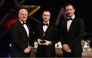 3 November 2017; Antrim hurler Chrissy O'Connell is presented with his Christy Ring Champion 15 award by Uachtarán Chumann Lúthchleas Gael Aogán Ó Fearghail, left, and David Collins, GPA President, during the PwC All Stars 2017 at the Convention Centre in Dublin. Photo by Piaras Ó Mídheach/Sportsfile
