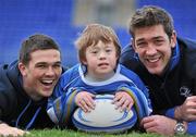 6 April 2011; St Michael’s House, one of Ireland’s largest providers of community based services for children and adults with an intellectual disability, has teamed-up with Leinster Rugby to promote tag rugby for those with an intellectual disability in Ireland. Leinster’s Ireland ‘A’ centre Eoin O’Malley, right, and Scotland and Lions lock Nathan Hines, along with St Michael’s House service user Evan Dowling, age 10, who turned out to celebrate the launch of the partnership at Leinster’s Donnybrook Stadium today. St Michael’s House has introduced tag rugby training for their service users to promote social inclusion and boost physical well being. Representatives from Leinster Rugby are currently training over thirty St Michael’s House service users to compete in a tag rugby blitz this summer. Donnybrook Stadium, Donnybrook, Dublin. Picture credit: Brian Lawless / SPORTSFILE