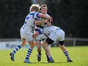 6 April 2011; Mark Nicholson, Clongowes Wood College SJ, is tackled by Justin Murphy, left, and Conor Quinn, Blackrock College. Leinster Schools Senior Seconds Final, Blackrock College v Clongowes Wood College SJ, Templeville Road, Dublin. Picture credit: Barry Cregg / SPORTSFILE