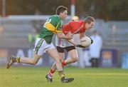 6 April 2011; Peter Daly, Cork, in action against Alan Fitzgerald, Kerry. Cadbury Munster GAA Football Under 21 Championship Final, Cork v Kerry, Pairc Ui Rinn, Cork. Picture credit: Diarmuid Greene / SPORTSFILE