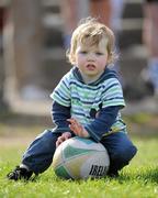 6 April 2011; Jack Moran, aged 2, from Terrenure, Dublin plays with a ball after the game. Leinster Schools Senior Seconds Final, Blackrock College v Clongowes Wood College SJ, Templeville Road, Dublin. Picture credit: Barry Cregg / SPORTSFILE