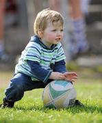 6 April 2011; Jack Moran, aged 2, from Terrenure, Dublin plays with a ball after the game. Leinster Schools Senior Seconds Final, Blackrock College v Clongowes Wood College SJ, Templeville Road, Dublin. Picture credit: Barry Cregg / SPORTSFILE
